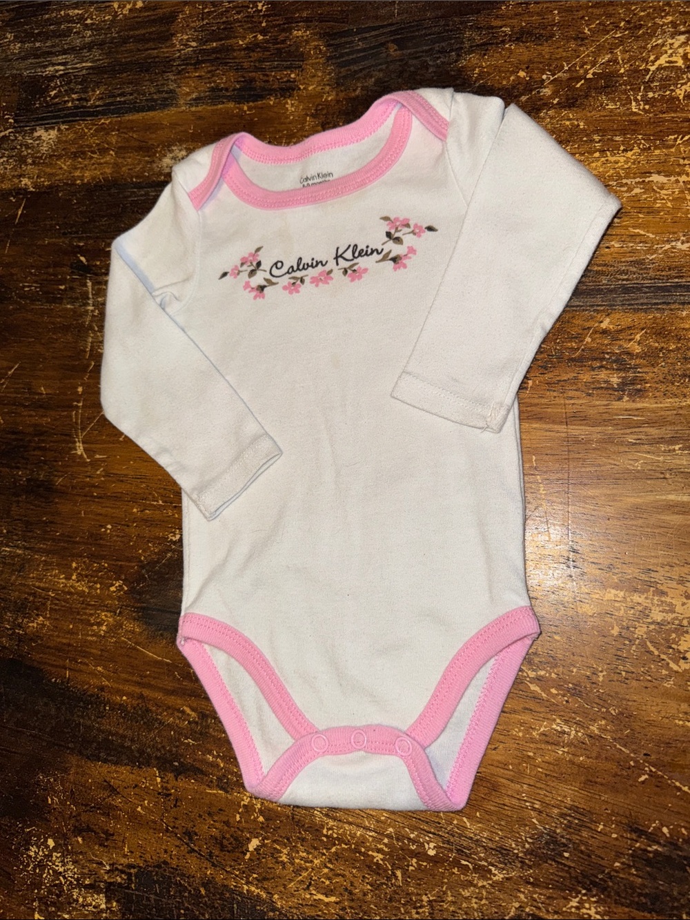 Calvin Klein White One-Piece with Pink Trim & Floral Logo